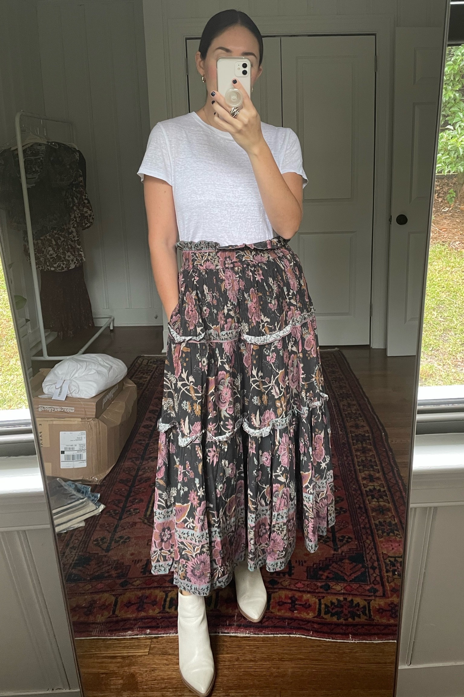 Western chic. Fall outfit. Fall fashion. Maxi skirt. Floral skirt. White T-shirt. Under $50. White booties. Midi skirt. Western booties. 

#LTKunder100 #LTKshoecrush #LTKSeasonal