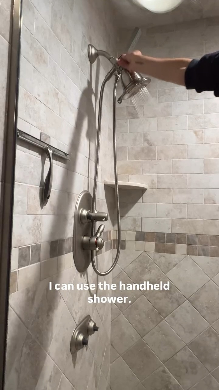 And just like that we are back in business and the master bathroom shower works again with no leaks! 

We had the plumber install the 3 way diverter to our existing shower head so we could add the handheld shower. It was perfect and was super affordable. Now I can just switch to the handheld when cleaning the shower. It’s perfect to add to your bathroom if you have pets or kids. 

This bathroom shower remodel has been quite the process but I’m so grateful we did not rip out the entire walk in steam shower and start over. 

Always get 3 estimates on your bathroom remodel project. 

#steamshower #bathroomideas #viralreel #showercleaning #viralreels❤️ #walkinshower #bathroomremodel