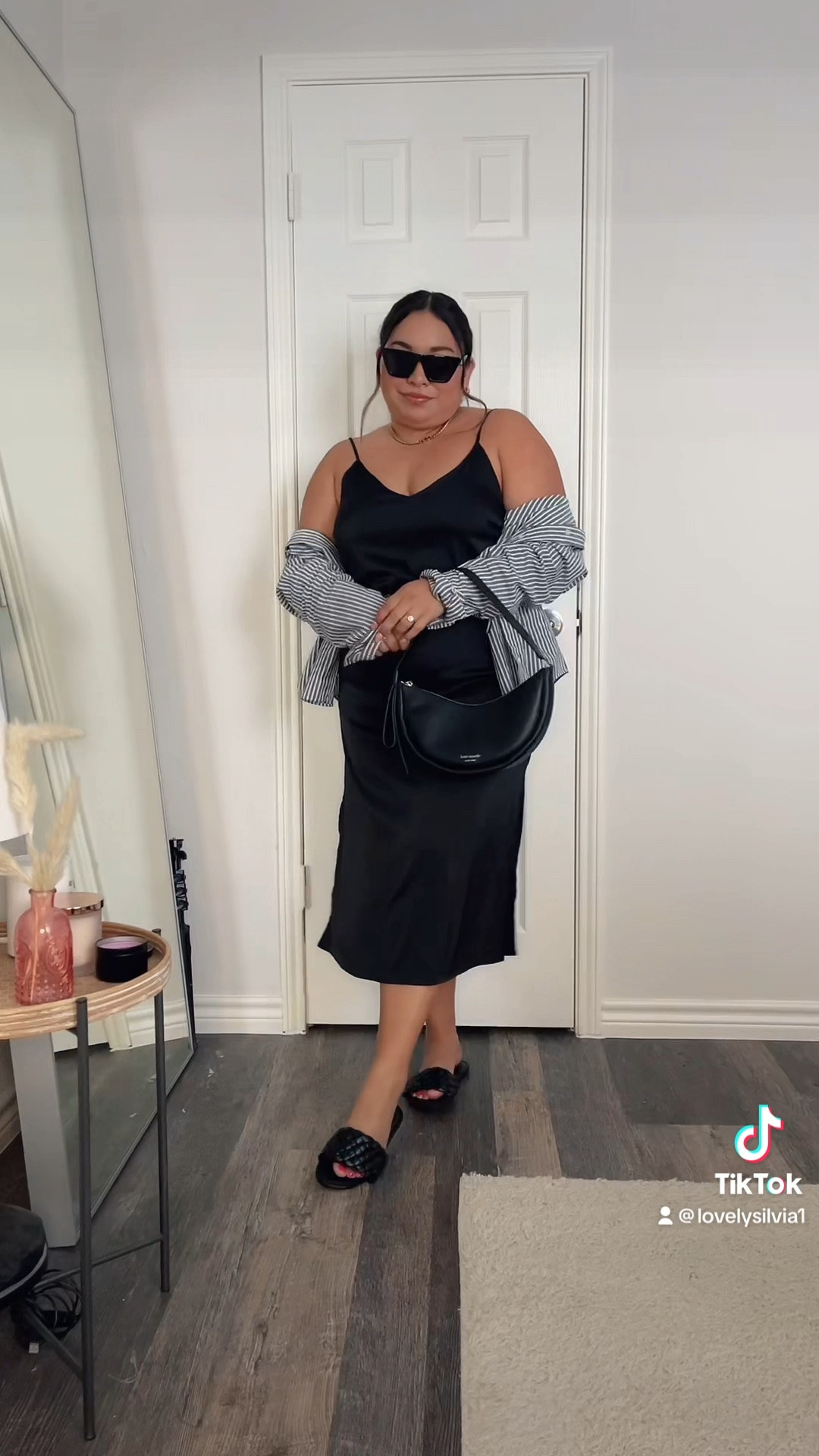 30 Days of Outfits: Day 29 is a black slip dress 🖤

black dress, black summer dress, black midi dress, black slip dress, striped button down shirt, black sandals, summer outfit, summer fashion 

#LTKstyletip #LTKSeasonal #LTKunder100