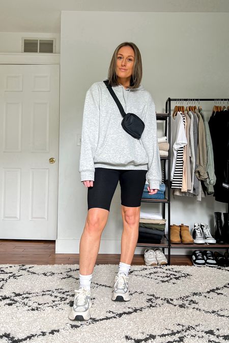 Summer outfit. Travel outfit. Casual outfit. Sumemr outfit idea. Casual outfit idea. Hoodie. Hooded sweatshirt. Bike shorts. Sneakers. Crew socks. Mom outfit.

Sizing Hoodie is a medium.

#LTKunder50 #LTKunder100 #LTKstyletip