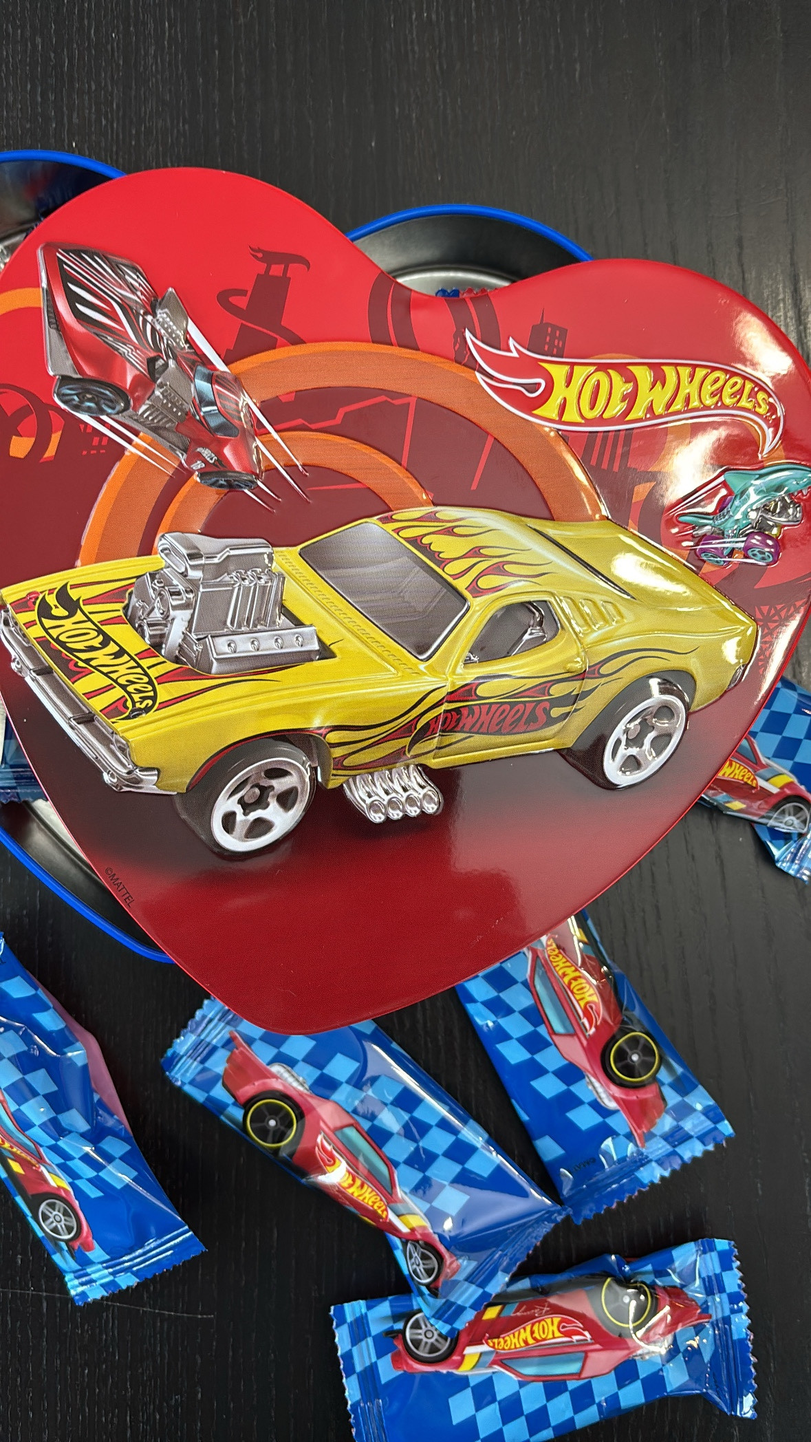 Attention all moms and dads with kids who love cars and trucks! These Hot Wheels Valentines tins are so fun. It comes with 12 wrappers chocolate hearts. Perfect for your toddler’s Valentine’s Day  

#LTKSeasonal #LTKKids