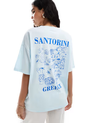 ASOS DESIGN oversized T-shirt with Santorini graphic in baby blue | ASOS (Global)