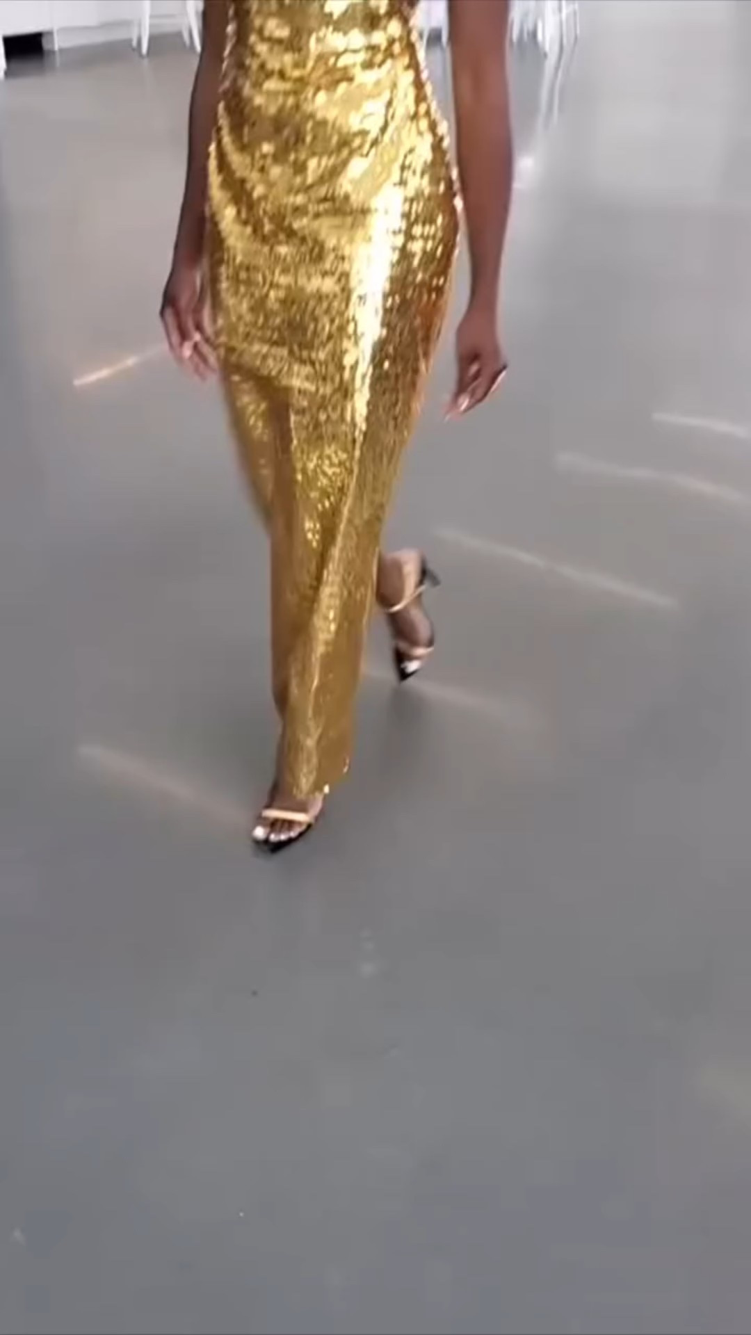 Golden touch ✨ @titiakin_ styling me for a client’s shoot, bringing pure elegance in this stunning sequined masterpiece! #StyledToShine #GoldenGlam