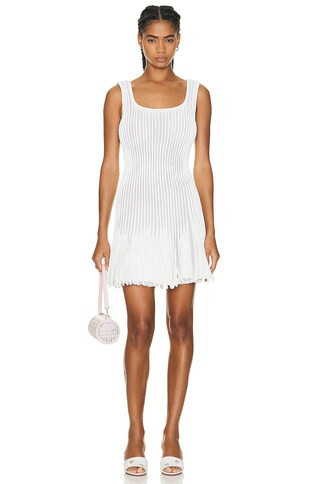 ALAÏA Pleated Mini Dress in White | FWRD 
