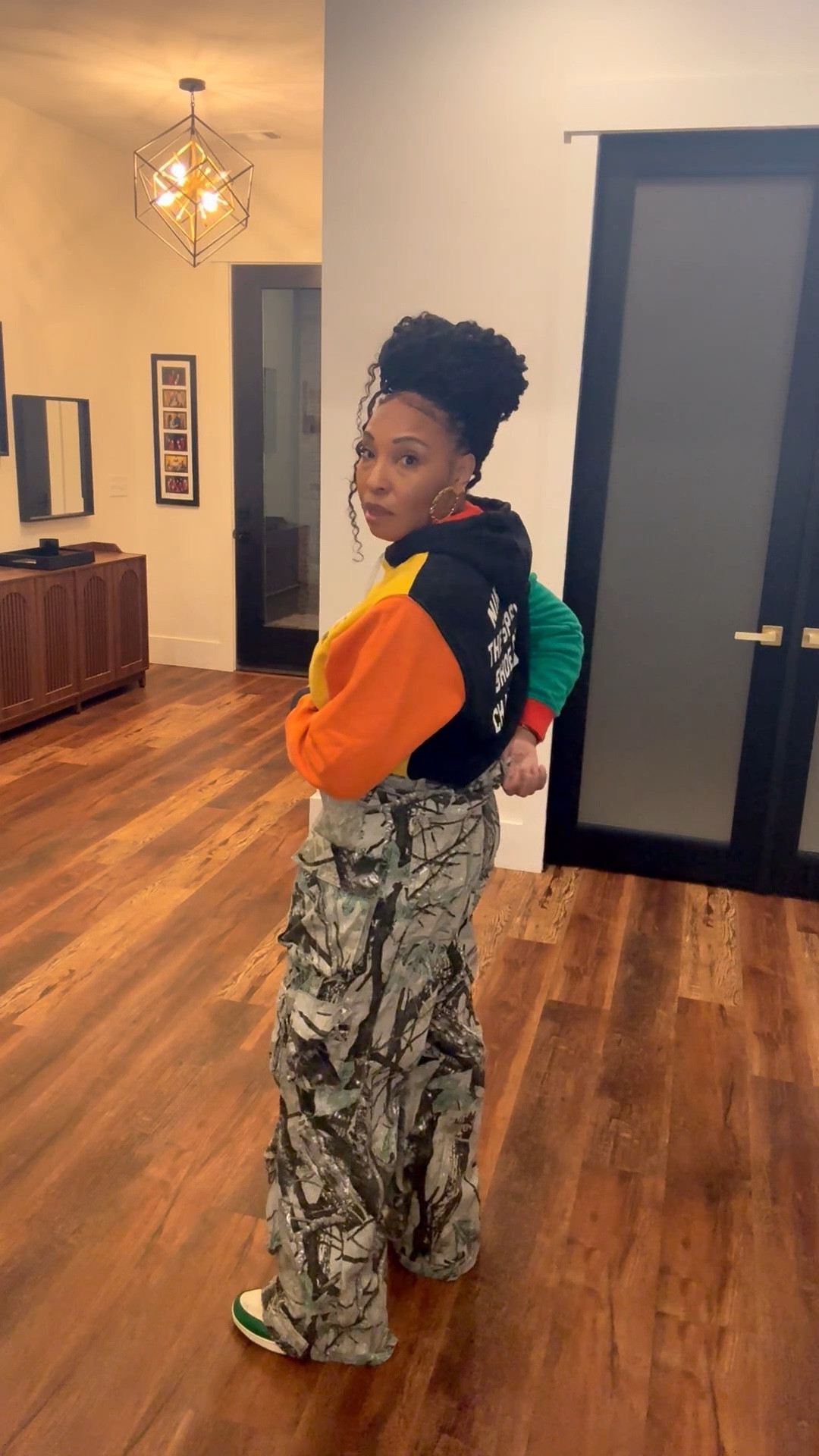 The bold casual formula:

✔️ Structured hoodie
✔️ Relaxed cargo pants (size down if between sizes)
✔️ Color-coordinated sneakers

Comfortable. Confident. Weekend ready.

Linked similar hoodies, camo cargo pants, and everyday sneakers so you can recreate the look.
