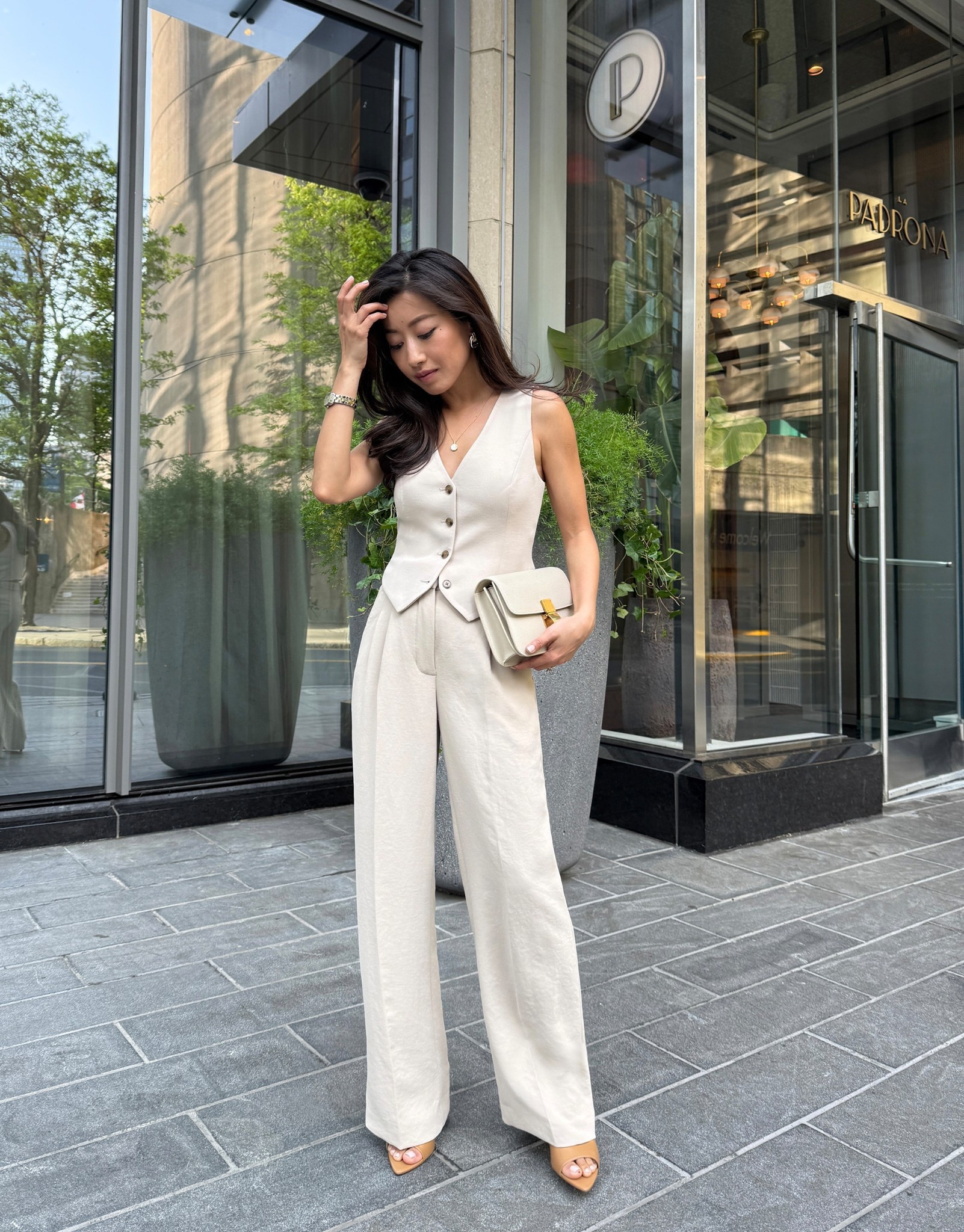 Dinner party in Boston outfit 

Been loving tailored vests and pants as a chic alternative to a dress!

• Petite friendly Vest size 0 in marcona beige wearing with a regular bra . 

This is a more warm toned light beige and the coloring in the other video I posted today is more accurate for marcona beige than this photo. I sized up in the vest for room at the chest. 

• aritzia effortless trouser pants size 0 Short. my pants are actually an old effortless trouser in a slightly off color but I wore them together. 

I’m also between sizes in the pants so went up for a little extra room. I have a 25” waist now and Their 00 usually fits a 24 waist well. 

• the lodge pant is an amazing alternative if you like a more laid back pull on style! But it only comes in one length at this time

• mango sandals walked over half a mile in these with no discomfort! I also recommend foot balm with any heel whenever the shoe edges touch your feet 

• vintage Celine box bag 

• soohiya necklace

• mayhem earrings in 2 tone

Elegant Dinner out, sophisticated date night outfit, meeting or presentation corporate workwear look 

#LTKWorkwear #LTKPetite #LTKShoeCrush