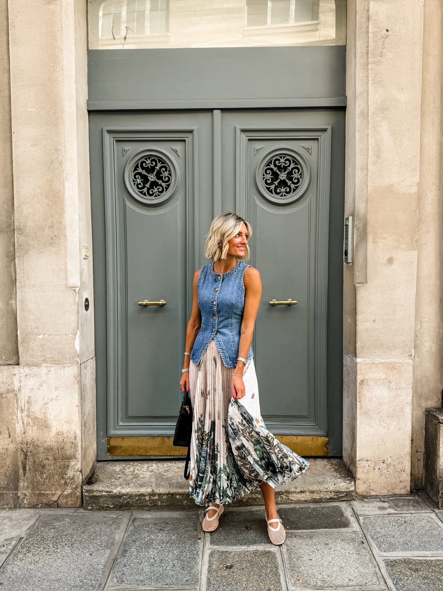 Love how this outfit turned out! This skirt is such a fun piece to have in your closet! Wearing XS/0!

Loverly Grey, Paris outfits, Europe outfits, denim vest, denim top, midi skirt, transitional outfits, mesh ballet flats 

#LTKStyleTip #LTKSeasonal #LTKTravel