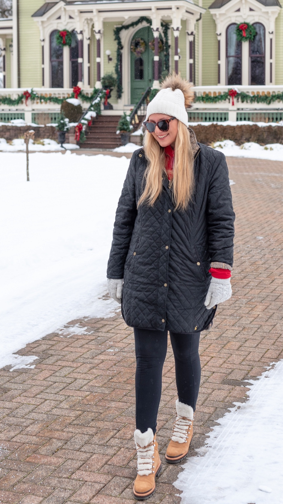 Winter walk uniform. One of my most worn snow boots, white pompon hat, quilted black coat (similar) Vineyard Vines Dreamcloth sweatshirt shep shirt, black compression leggings with iPhone pocket.

#LTKover40 #LTKfitness #LTKSeasonal