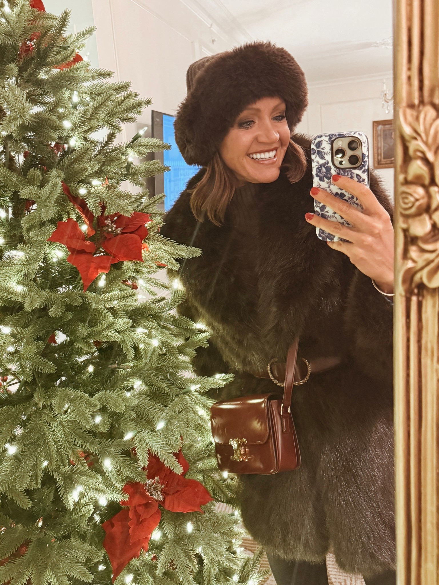 Xs In brown mock neck sweater 
Xs in faux fur coat 