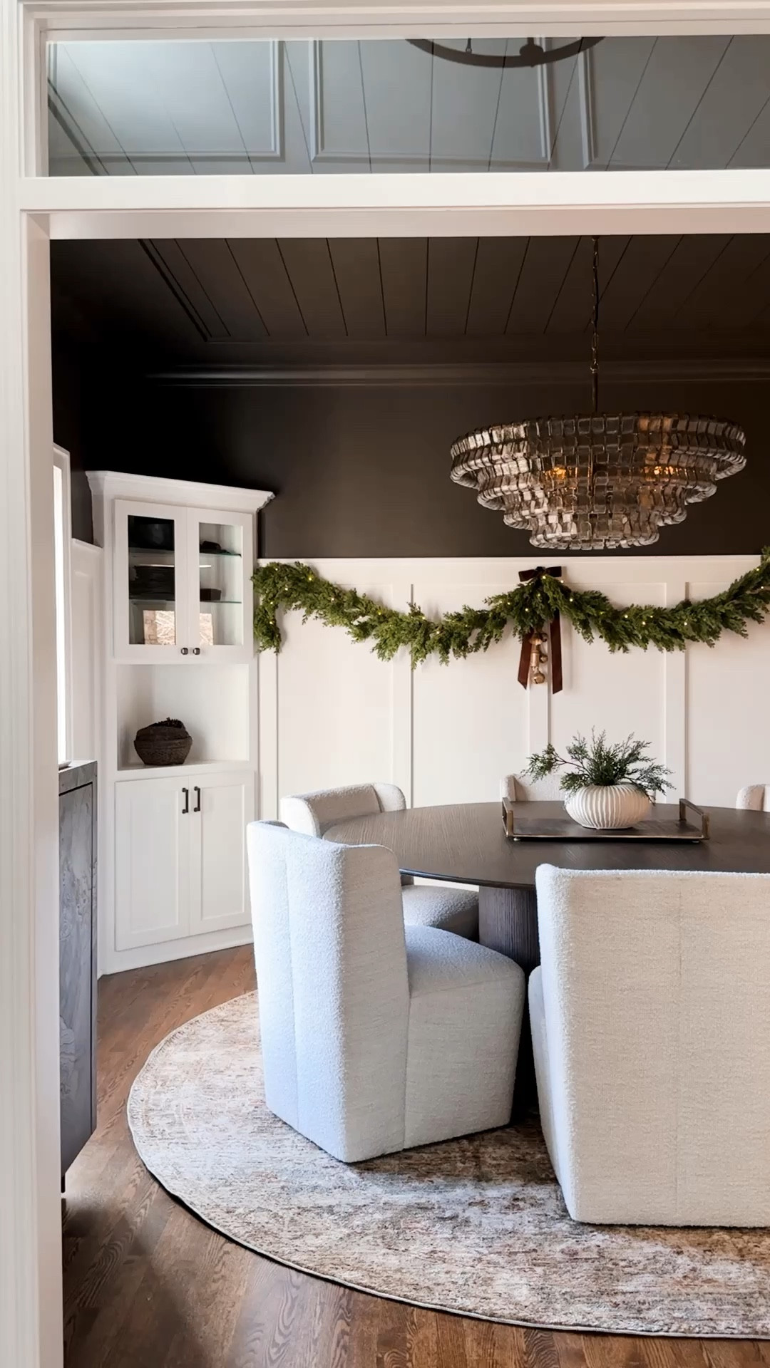 Dining Room Garland for the win! Every year I add this garland to our formal dining room and it the perfect amount of festive! I love to use a set of bells and ribbon where the two garlands meet in the middle! 

#LTKHoliday #LTKHome #LTKWatchNow