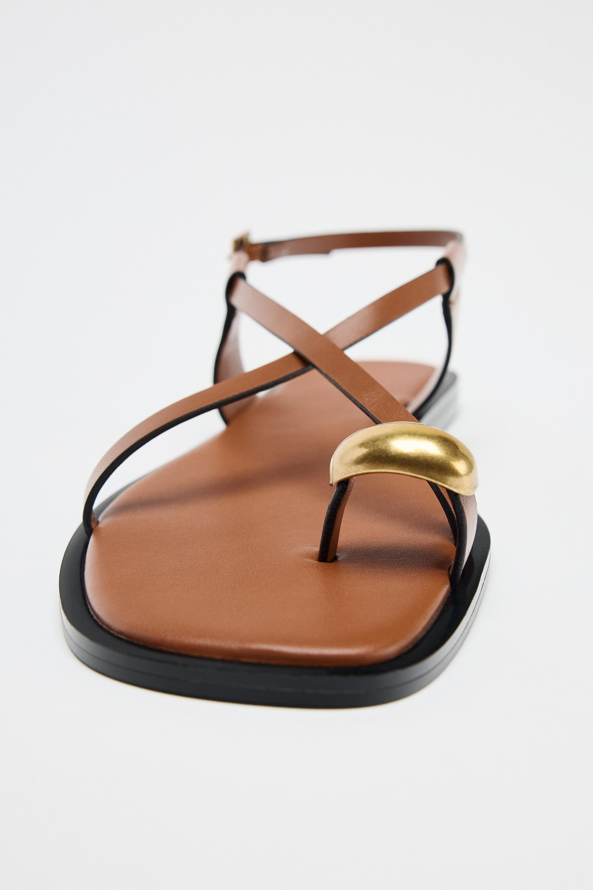 Flat sandals with thin straps and metal toe detail. Buckle fastening.Sole height: 1.5 cm / 0.5″... | Zara UK