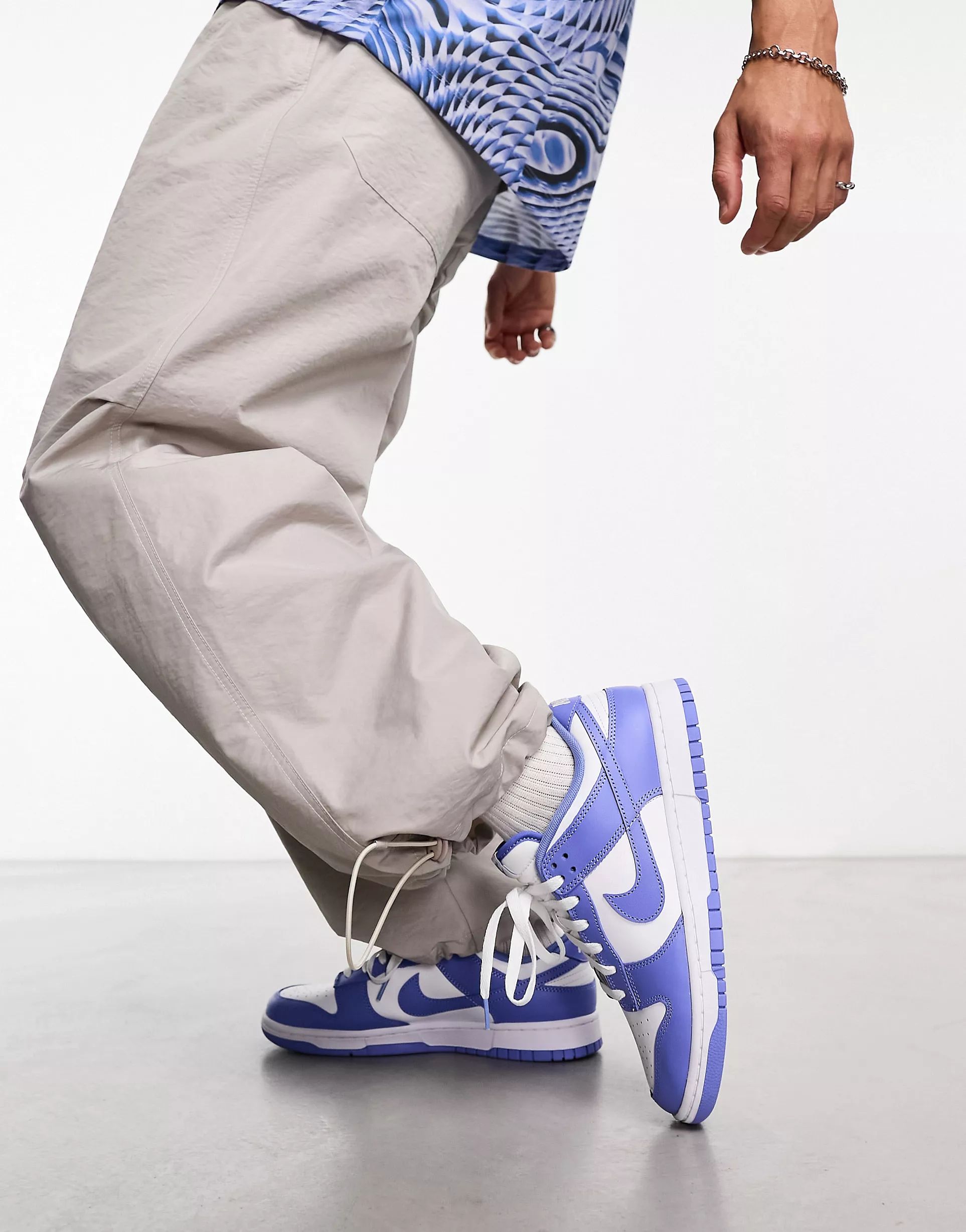 Nike Dunk Low Retro trainers in white and blue | ASOS | ASOS (Global)