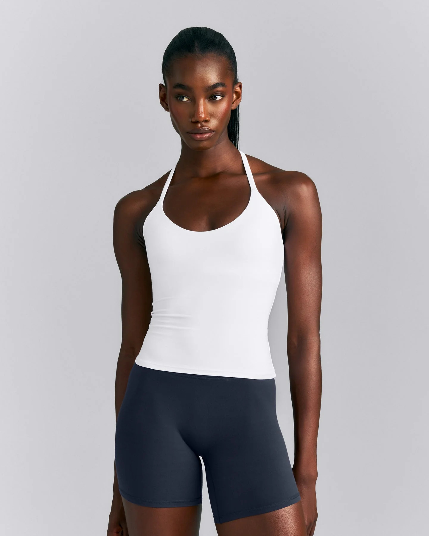 SoftMotion\u2122 Strappy Halter Neck Vest with Built in Bra Shelf New Branding 
 White | Oner Active (UK / US)