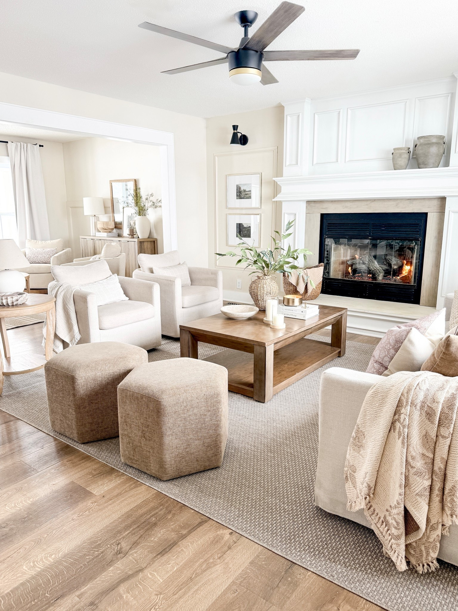 Living room inspo, living room furniture, accent chair, swivel chair, living room chair, sofa, couch, area rug, neutral rug, end table, coffee table, home decor, wall decor, wall frame 

#LTKHome #LTKSaleAlert