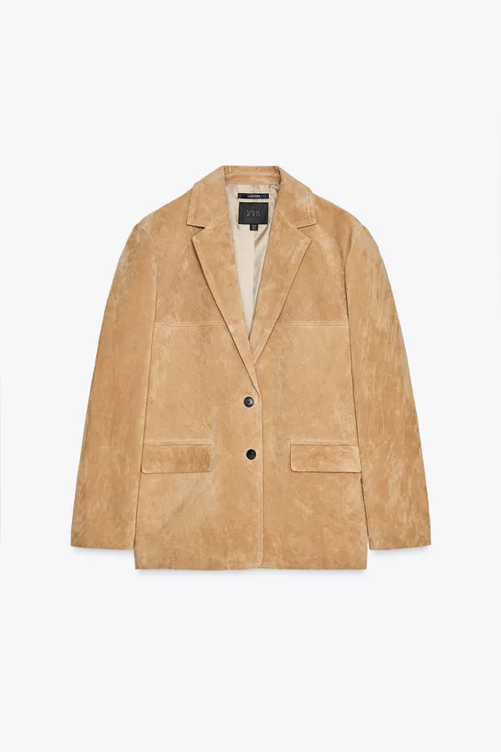 Blazer made of 100% suede leather. Lapel collar and V-neck with long sleeves. Front flap pockets.... | Zara UK