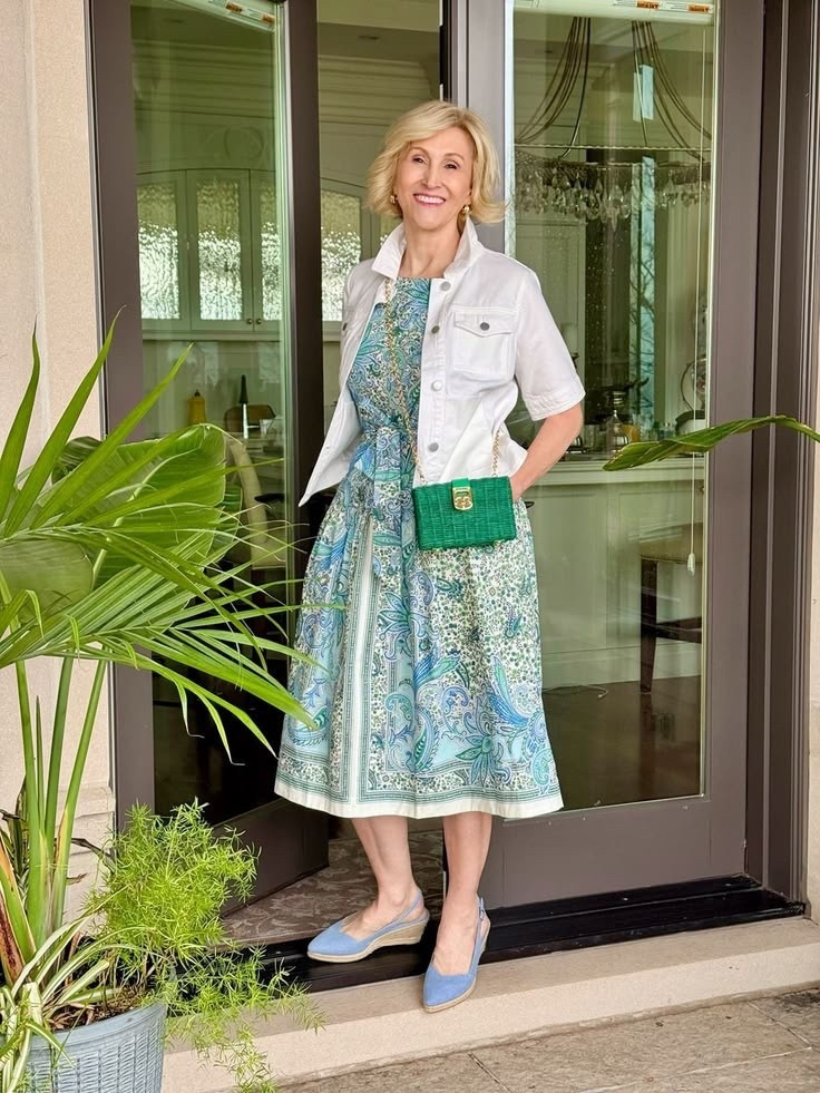 This look just feels like summer in an outfit 💙💚

I’m wearing a blue and green patterned dress from Talbots and layered it with a white short sleeve denim jacket (because you never know when you’ll need that extra layer). Added a green wicker crossbody for a fun pop of texture and finished it off with denim wedges to tie it all together.

It’s easy, a little playful, and perfect for those days when you want to feel put together without trying too hard ✨

Would you wear this for a lunch out or a casual day running around?


#LTKSeasonal #LTKOver40 #LTKootd