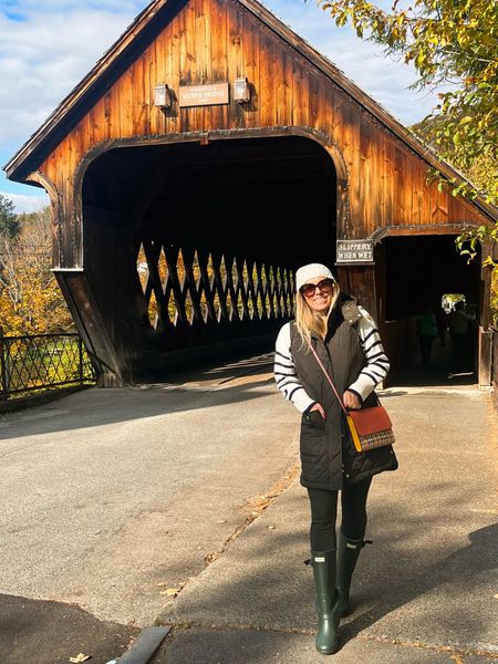 Layers & wellies & pops of plaid~ 
a fall uniform 🍂

Squeezing in all the things fall while the foliage lasts! Walks, views, and enjoying outdoor time. But I definitely plan on sprinkling in some holiday feels whilst enjoying my colorful leaves because that’s how I roll 😆 Am headed down to see family this weekend to have an early Thanksgiving and am bringing down all sorts of crafts stuff to make ornaments with my niece & nephew. Santa with a side of turkey, yes and please! Happy almost Friday friends! 

This shot is from our VT road trip when we checked out the charming downtown area of Woodstock- a must to hit in the fall!  Similar striped sweater linked here along with this amazing long puff vest and my favorite Hunters for anyone looking for some great colder weather gear👉🏻

#LTKtravel #LTKSeasonal #LTKsalealert