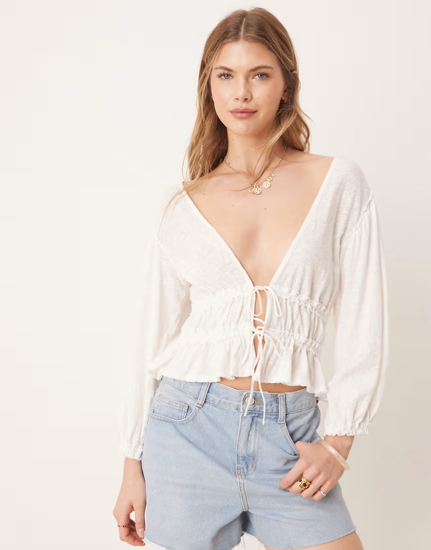 Free People tie-front jersey blouse in ivory-White | ASOS (Global)