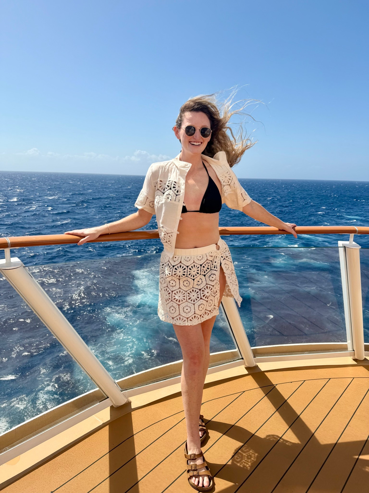 Affordable and comfortable swim beige crochet coverup skirt and top. Black triangle style bikini with adjustable tie bottoms. Brown birks 

#LTKTall #LTKspring #LTKSwim