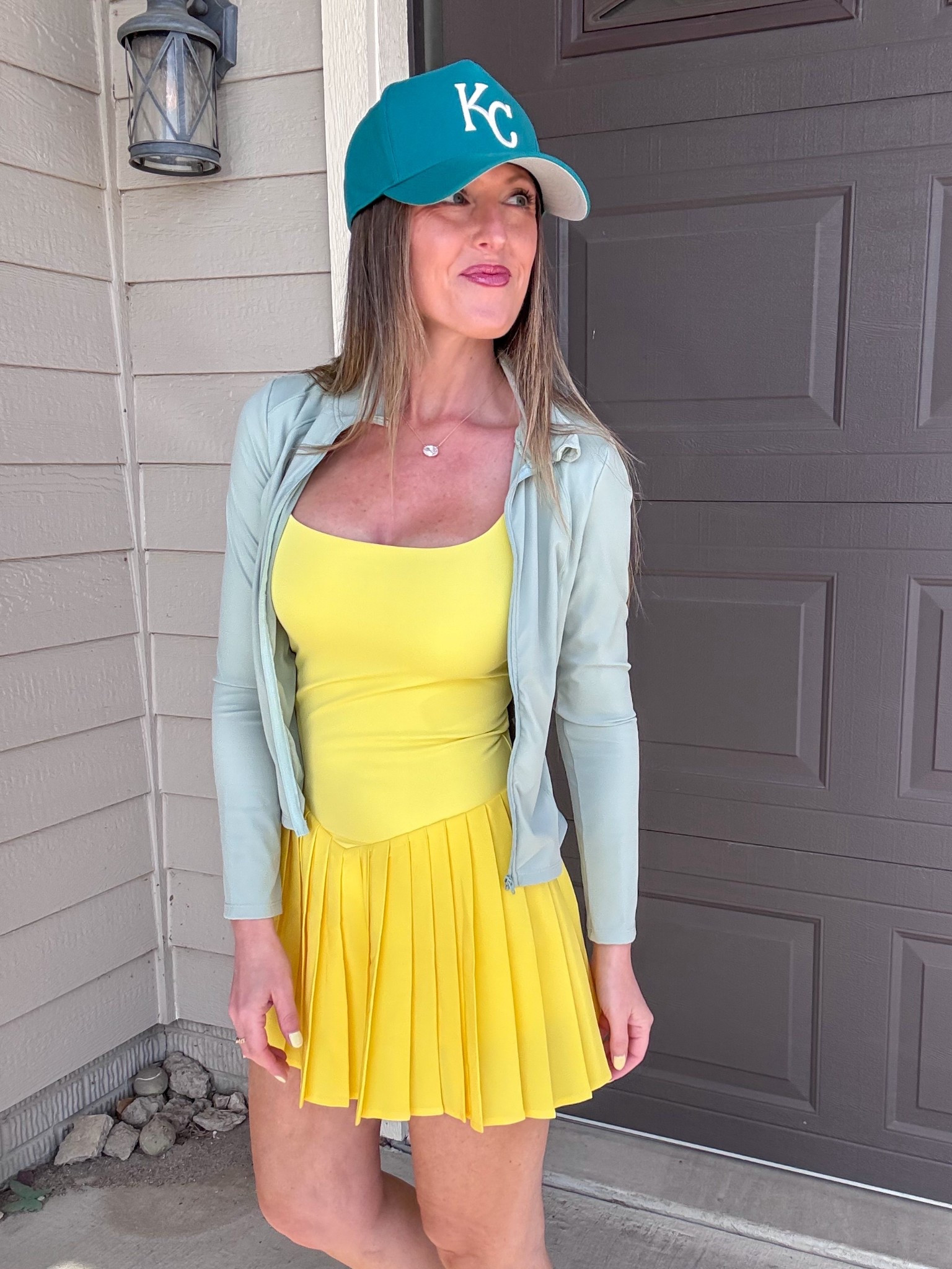 Loving this unexpected color combo for spring! 💛 Each of these items, the light green jacket, the jade green Royals cap and the yellow sports dress, is so good! Wearing a small in the dress and xsmall in the jacket. 

As an Amazon Influencer I earn commission on qualifying purchases. 

Sporty outfit inspiration, spring style, mom approved spring outfit, tennis dress, yellow outfit, sports mom inspired look

#LTKMidsize #LTKmomlife #LTKootd