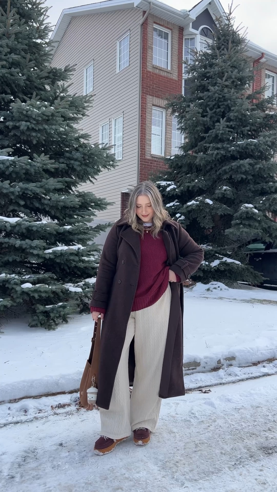 Comfy winter outfit! Cream cable knit wide leg lounge pants, wearing my usual size L. Also wearing L in the softest burgundy chenille sweater. I love the high neck on this white tee for layering! Wearing L. This chocolate brown wool trench coat is such a good winter staple piece, wearing L. My Sorel snow boots are waterproof and so warm! Consider sizing up if you plan to wear thick socks


#LTKsale #LTKwinter #LTKmidsize