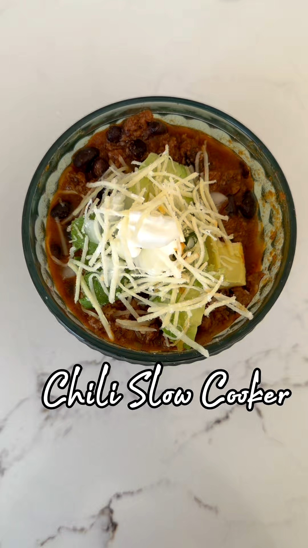 Slow Cooker Chili 🌶️ 
Ingredients:
2 pounds ground beef 1 onion diced 1 jalapeño seeded and finely diced 4 cloves garlic minced 2 ½ tablespoons chili powder divided, or to taste 1 teaspoon cumin 1 green bell pepper seeded and diced 14.5 ounces crushed tomatoes 1 can
19 ounces canned black beans drained and rinsed (I do black instead of kidney)
14.5 ounces canned diced tomatoes with juices 1 ½ cups beef broth 1 tablespoon tomato paste 1 tablespoon brown sugar optional
salt and black pepper to taste

- [ ] 1) Combine ground beef and 1 ½ tablespoons chili powder. 
- [ ] In a large pot, brown ground beef, onion, jalapeno, and garlic. Drain any fat. 
- [ ] Add in remaining ingredients and bring to a boil. Transfer pot to slow cooker heat on low 2 hours. 
- [ ] Top with cheddar cheese, green onions, cilantro or other favorite toppings. 
Optional toppings: sour cream, red or green onion, cheese, jalapenos, cilantro, avocado & lime wedges, tortilla chips



#LTKvlog #LTKmomlife #LTKdayinmylife