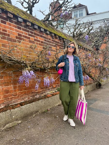 Denim jacket, lilac purple tank, green khaki straight trousers, white converse, pink handbag, black sunglasses, pink striped tote bag, gold necklace 

#LTKeurope #LTKstyletip #LTKSeasonal