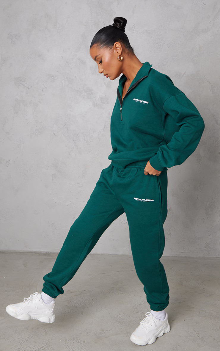 PRETTYLITTLETHING Forest Green Logo Print Cuffed Sweatpants | PrettyLittleThing US