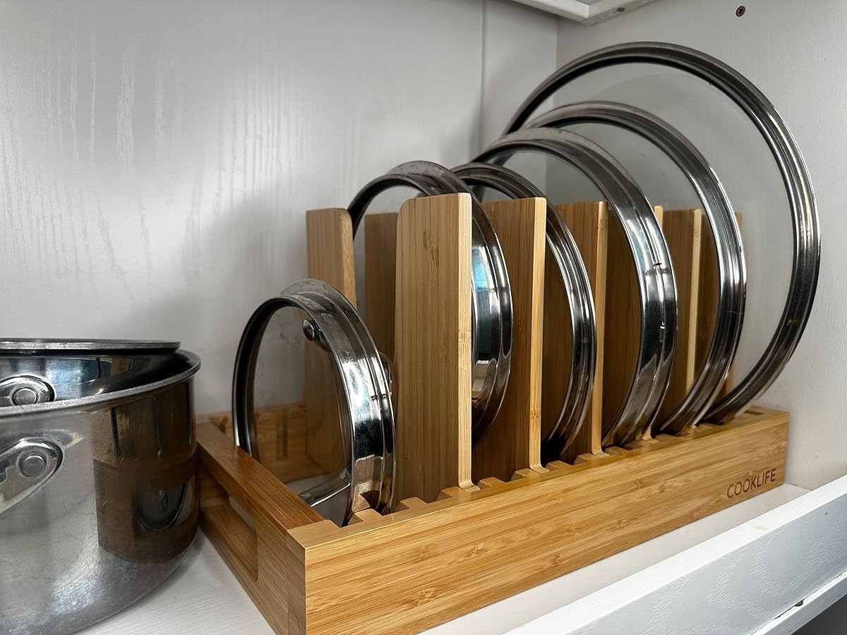 Keep your kitchen tidy and organized with the COOKLIFE Bamboo Pot and Pan Organizer. Perfect for keeping your pot lids in place and your cooking space clutter-free.#KitchenOrganization #CookwareStorage #BambooOrganizer

#LTKHome #LTKFamily #LTKItBag