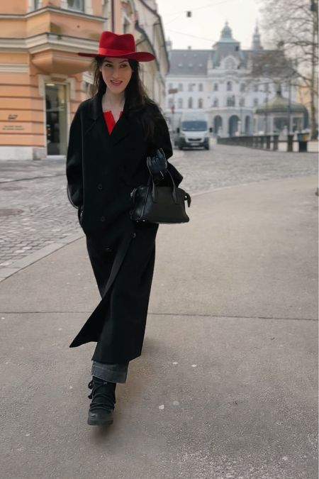 This winter, ditch the bulky sweaters and embrace the effortless cool of my outfit. The long black coat from LouLou Studio is a classic winter essential, while the red fedora hat adds a pop of red that is trending for winter 2024 #streetwear The red #cardigan sweater keeps you warm and stylish, and the grey cropped jeans add a touch of casual flair. Finish off the look with the black Inuikii boots for a touch of chic. This outfit is perfect for a casual brunch or a day out exploring the city. #LTKGIFT #hat #jeans #coat

#LTKshoecrush #LTKSeasonal #LTKstyletip