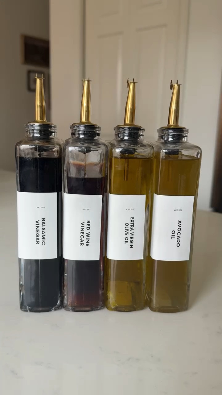 Comment the word LOVE and I will send the details directly to your inbox.

The easiest way to elevate an everyday item is to swap out mismatched grocery store containers for uniform labeled containers. These aesthetic oil bottles are my favorite find because they perfectly balance form and function. They turn a daily necessity into a design element while keeping your cooking essentials right at your fingertips.

Oil dispenser bottles | kitchen storage ideas, small space solutions, kitchen organization ideas, coffee bar storage, coffee syrup, at home coffee station, sauce storage, neutral kitchen, kitchen favorites, kitchen must haves, glass oil bottle, sauce dispenser, coffee syrup bottles 

#kitchenorganization #kitcheninspo #amazonfinds #amazonhome