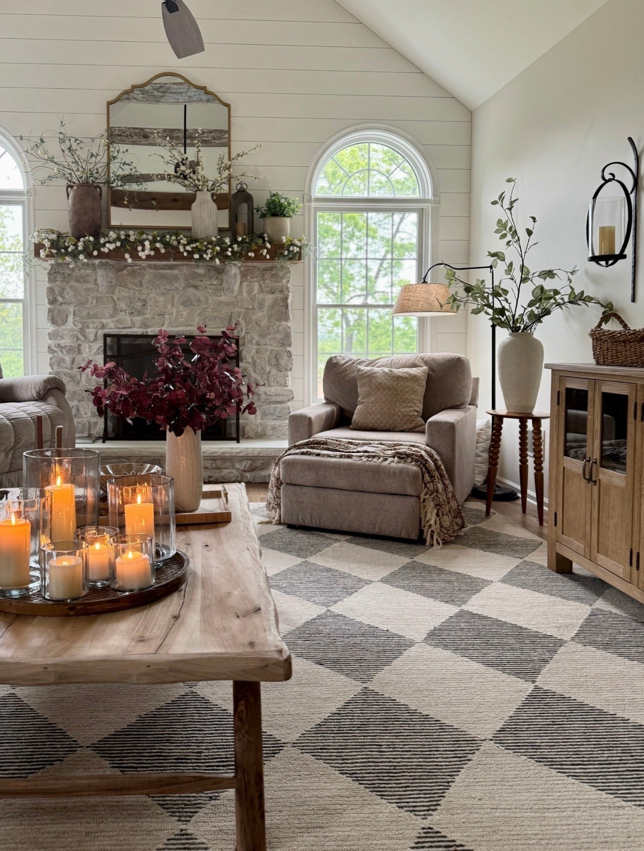 Our custom made reclaimed wood coffee table is an all time favorite piece of furniture and sells at a really good price point. Charcoal and beige geometric rug on sale! Neutral vases  Glass hurricane candle holders in 3 sizes. Curved arm floor lamp with linen shade. Solid wood accent table. Faux cascading cream hops florals on top of fireplace, handcrafted metal lantern, solid wood buffet table  

#LTKHome #LTKFindsUnder50 #LTKSaleAlert