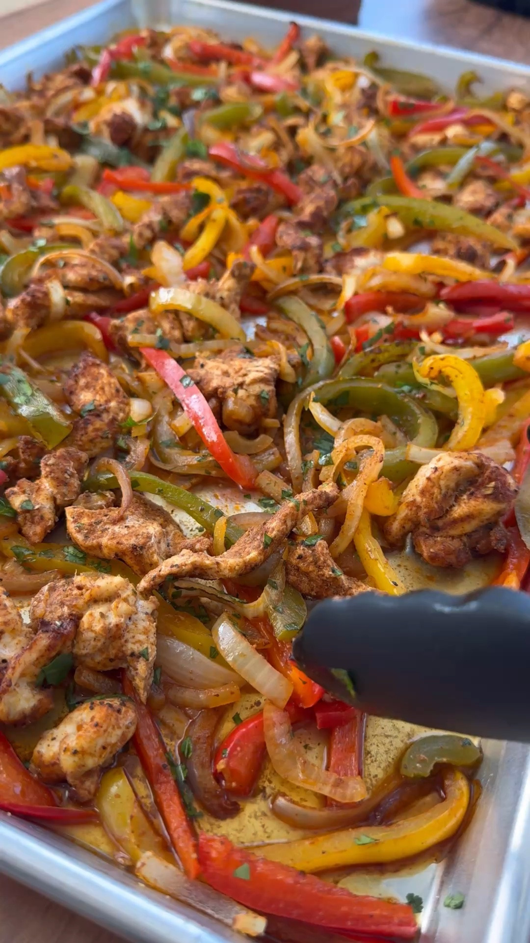 Sheet Pan Chicken Fajitas - one pan, 25 minutes, PEACE at my dinner table! 🌮✨ Kids eat happily! Homemade fajita seasoning is KEY (so much better than packets!). Slice chicken and veggies, toss with seasoning, bake! Make-ahead friendly. Sheet pan makes it foolproof! Shop my sheet pan + fajita spices below! Recipe on my blog! #sheetpanchickenfajitas #onepan #25minutes #kidseat

#LTKfoodie #LTKmomlife #LTKdayinmylife
