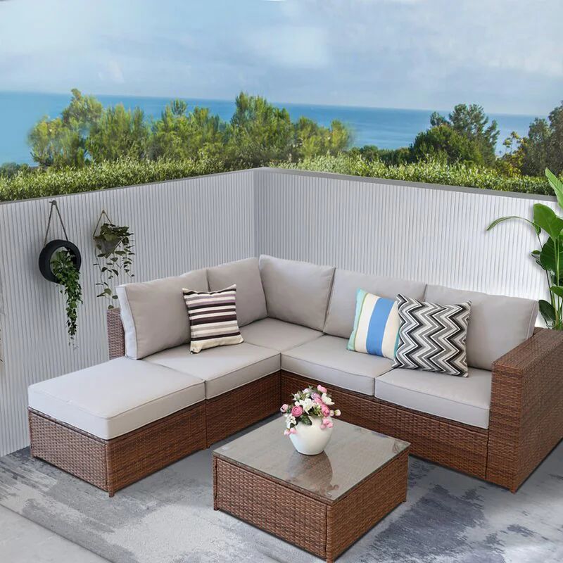 Gashije 4 Piece Rattan Sectional Seating Group with Cushions | Wayfair North America