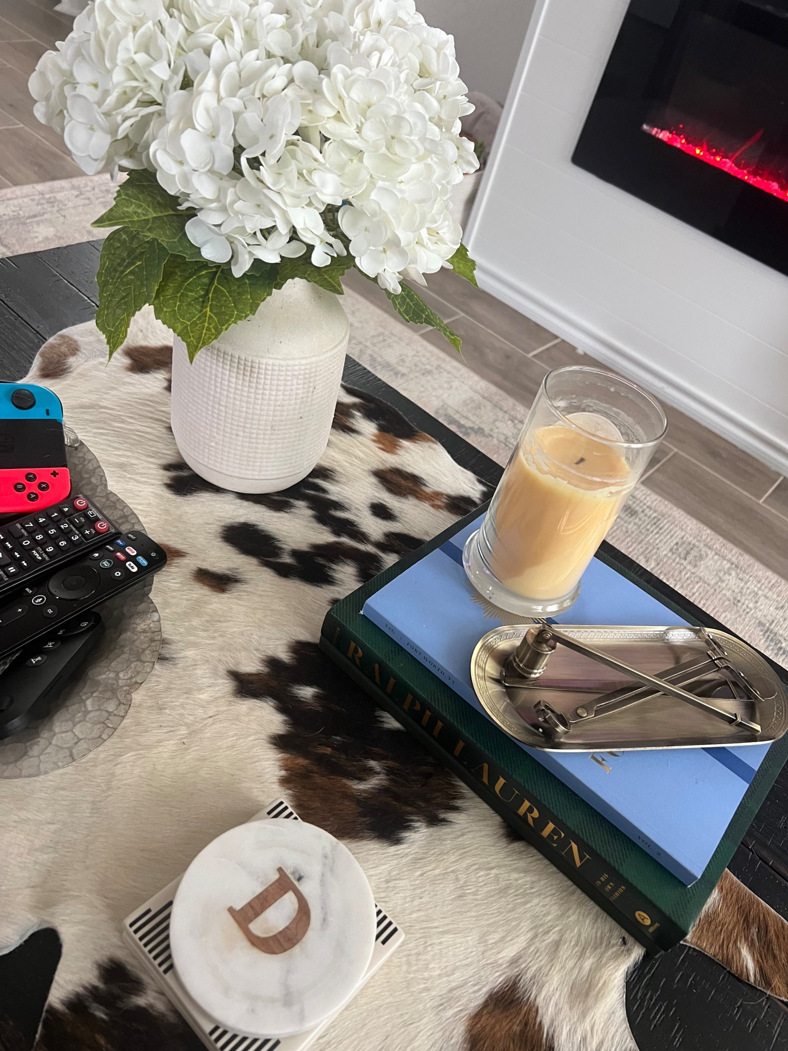 Spring coffee table decor is out at the Duncan house! 🍃🌸🌞

#coffeetabledecor #coffeetablebooks #ralphlauren #fauxflowers #candleset #amazonfinds #targetfinds 

#LTKSpringSale #LTKHome #LTKFindsUnder100