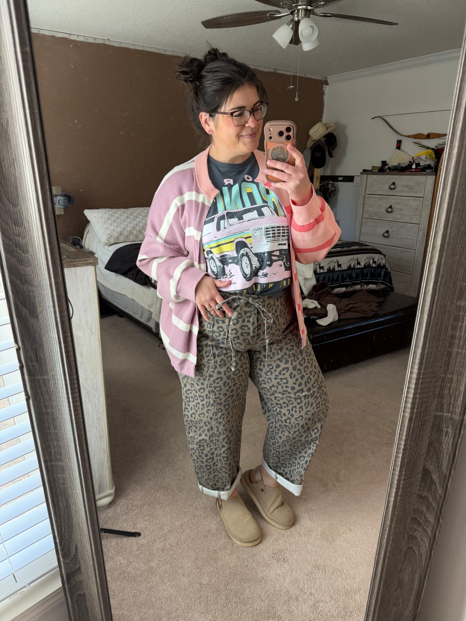 Date night but make it comfy-cute 💕🐆

Mixing a little edge with a little cozy in this graphic tee + striped cardi moment. The leopard pants add the fun, the pink layers soften it up, and the neutral shoes keep it grounded. It’s giving confident, effortless, and just dressed up enough without trying too hard.

Proof that plus size fashion can be playful, bold, and still feel like YOU. This is one of those easy spring outfits that works for grabbing dinner, strolling Target, or a casual date night outfit when you want to feel cute but stay comfortable.

Everything linked except pants. Linked similar ones for those 🤍

#LTKPlusSize #LTKootd #LTKMidsize