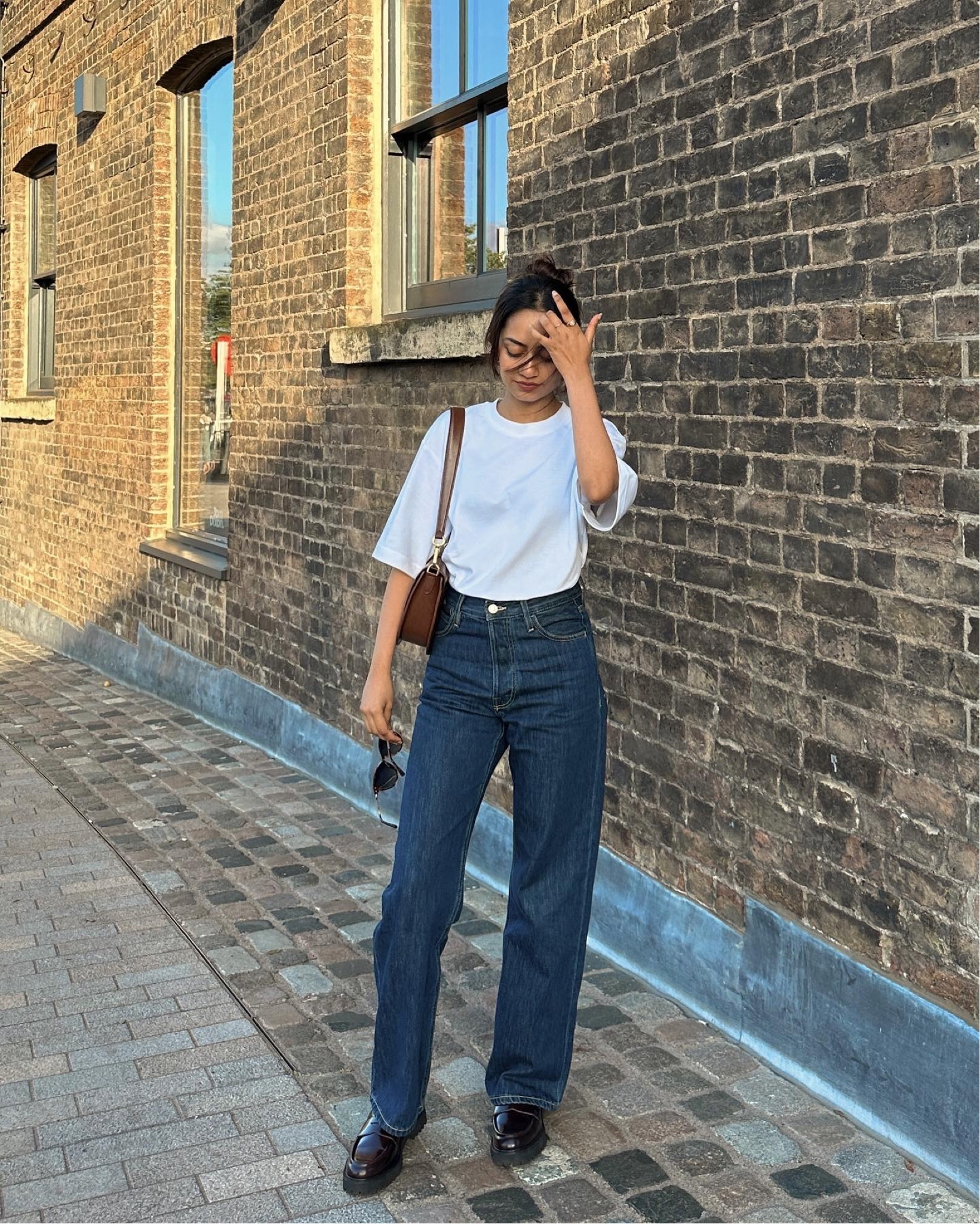 The classic white t-shirt and straight blue jeans combo that will never go out of style. 
Wearing XXS of the tshirt. 