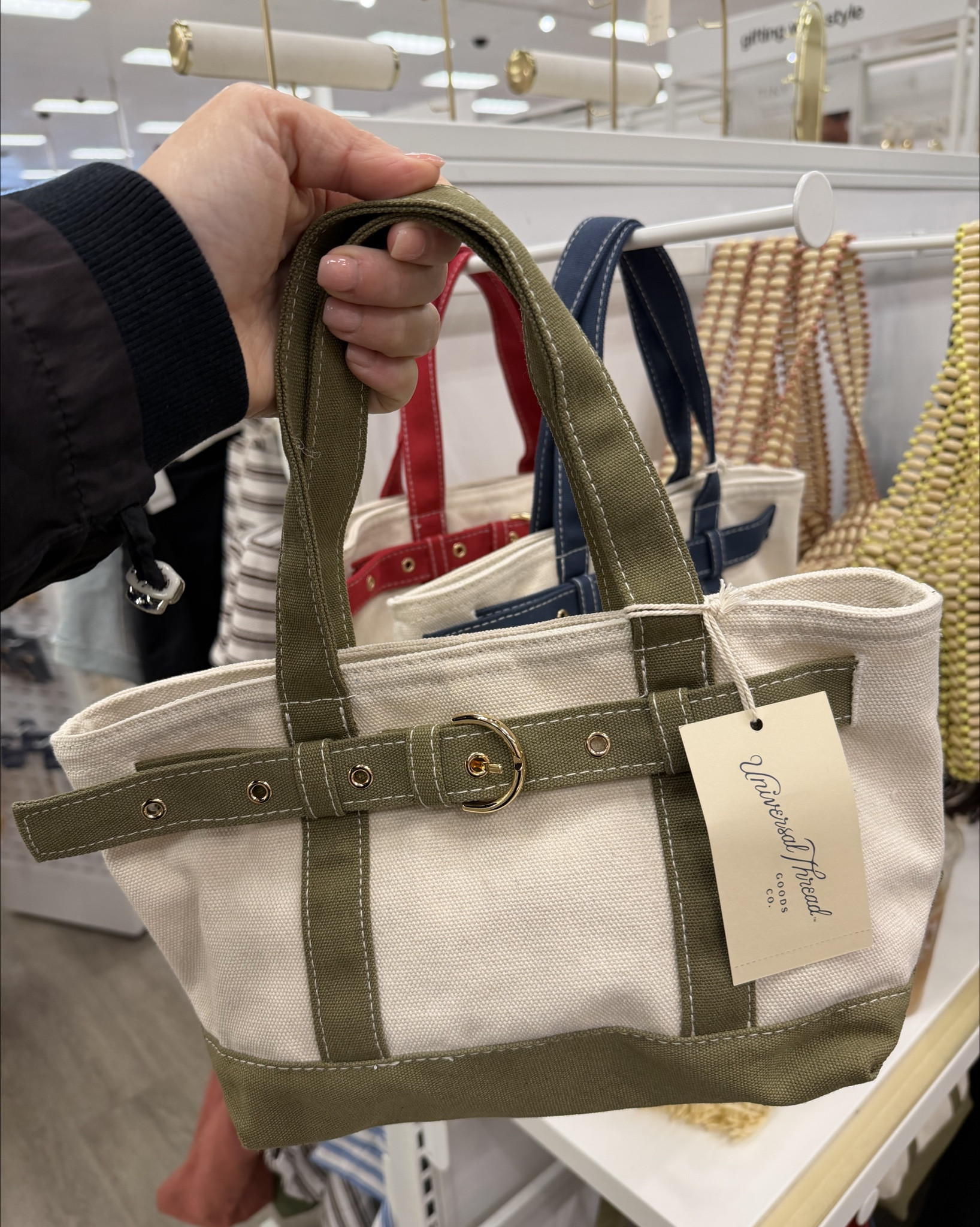 Canvas Mini Belted Tote Bag by Universal Thread from Target. Super cute buckle detail. Perfect size for grab and go. 3 colorways. #canvastote #bags #totebag #lookforless #target

#LTKootd #LTKgrwm #LTKMothersDay