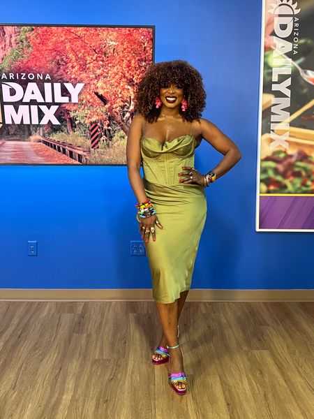 Fall Outfits For Tv style Segment Look! That can also pretty much be worn anywhere that needs an elevated Outfit & this green corsetry dress is it. No need for literally a bra or shape wear as it has you covered on both ends, the girls are snatched & lifted to the heavens lol! Paired with pops of colored earrings, bangles & my trusty multi colored metallic platform heels & I'm all set!

#LTKSeasonal #LTKwedding #LTKHoliday