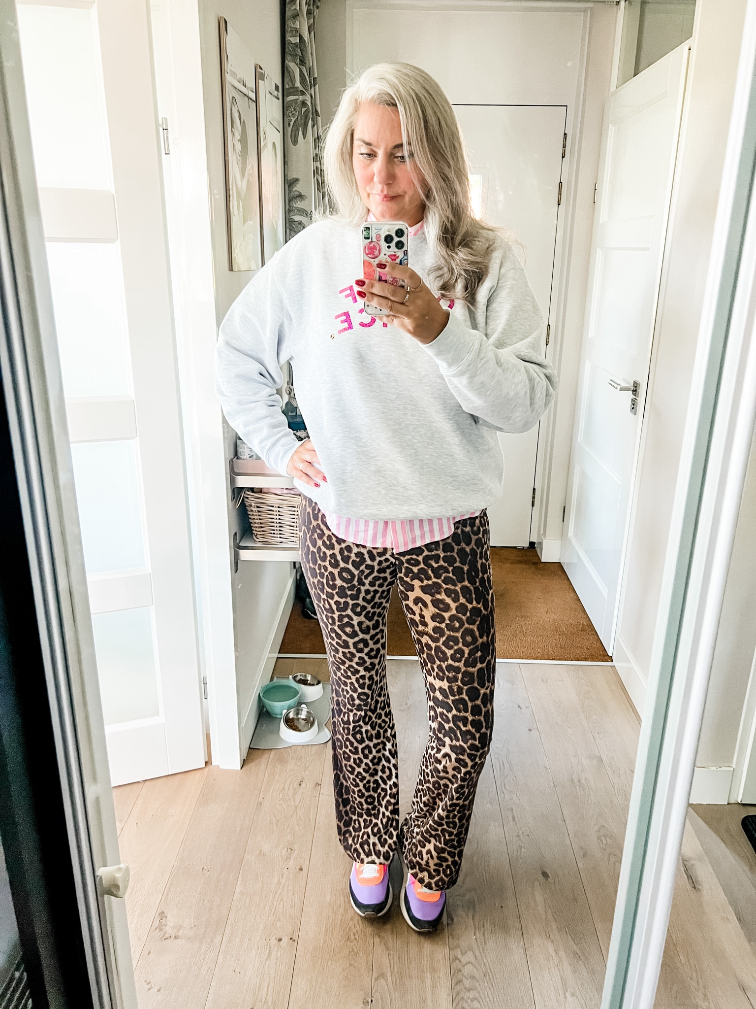 Ootd - Saturday. Oversized heather grey sweater (Shop Pop), pink and white striped shirt, leopard flared leggings. Retro Puma sneakers. 

#LTKeurope #LTKstyletip #LTKnederlands