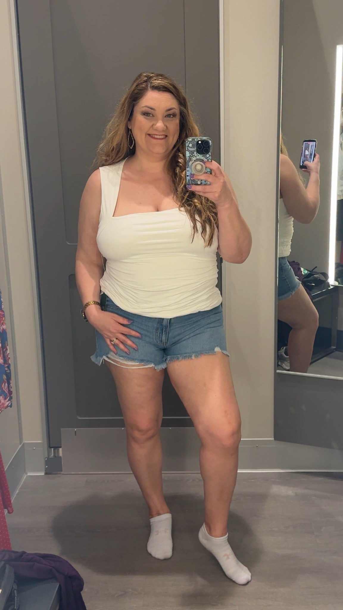 Cute white sleeveless top with a square neckline and denim shorts. This XXL top is very stretchy and could be paired with just about any bottoms. I’m wearing a size 16 in the shorts. 

#LTKootd #LTKPlusSize #LTKspring
