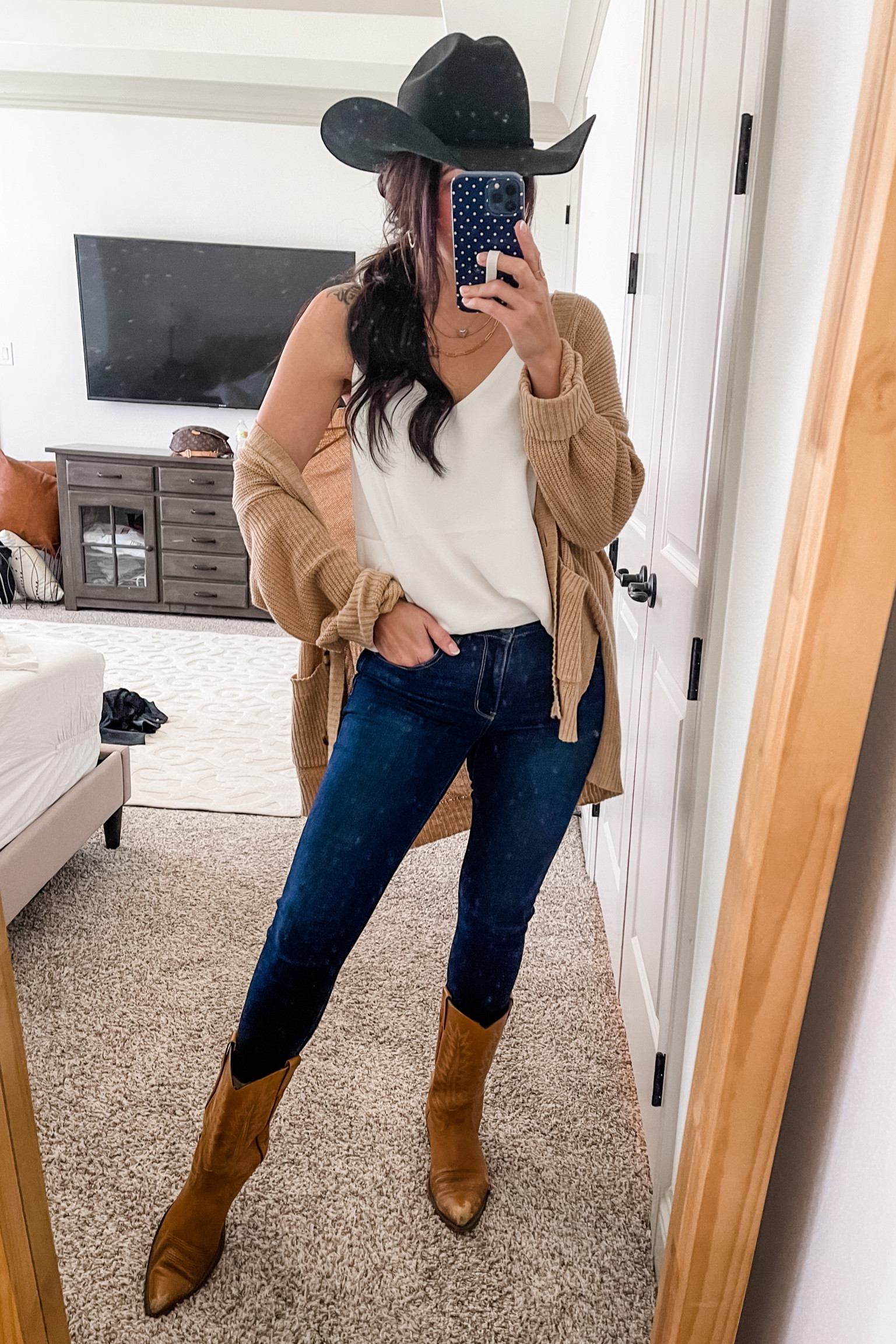 Cowboy hat 
Cowboy boots
Skinny jeans 
Fall outfit 
Cardigan 
Cami 

#LTKSeasonal #LTKunder50 #LTKstyletip