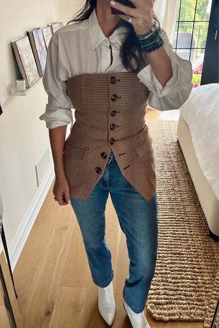 My outfit of the day, wearing my favorite daughter and sport max jeans. I layered a white button down shirt under and my white Fendi boots. 
I’m wearing a size 8 vest, it runs a little small

#LTKover40 #LTKworkwear #LTKstyletip
