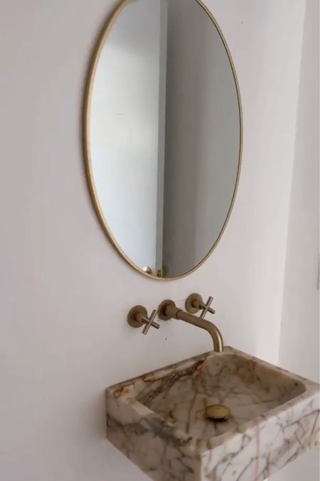 Downstairs Powder Room ✨  the exact mirror is out of stock so I linked one that is similar. 

Sink was made by linked manufacturer on Etsy in calcatta gold marble 🤍

Feel free to message me on IG if you have any questions 🤍 

#marblesink #beigeaesthetic #bathroom #custommade #goldfaucets #bohostyle #bohohome #beigehome #neutrals 