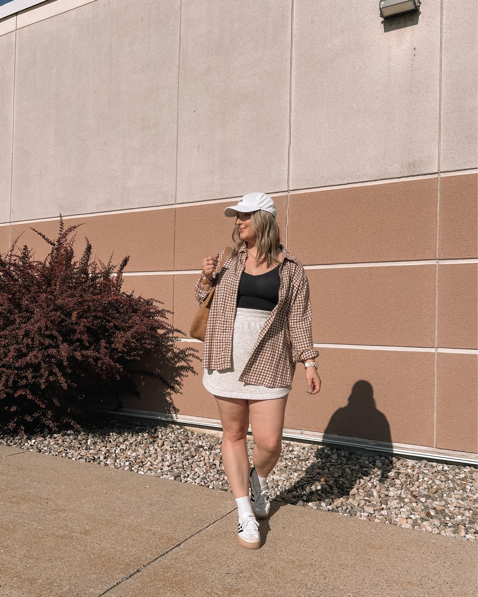 Summer to fall transition outfit with my fave athleisure skirt! It’s so comfy, flattering, and fits TTS - wearing L. I’m also wearing L in the HoneyLove shapewear cami, but could have done M. Linked similar plaid flannel shirts!



#LTKautumn #LTKcanada #LTKmidsize