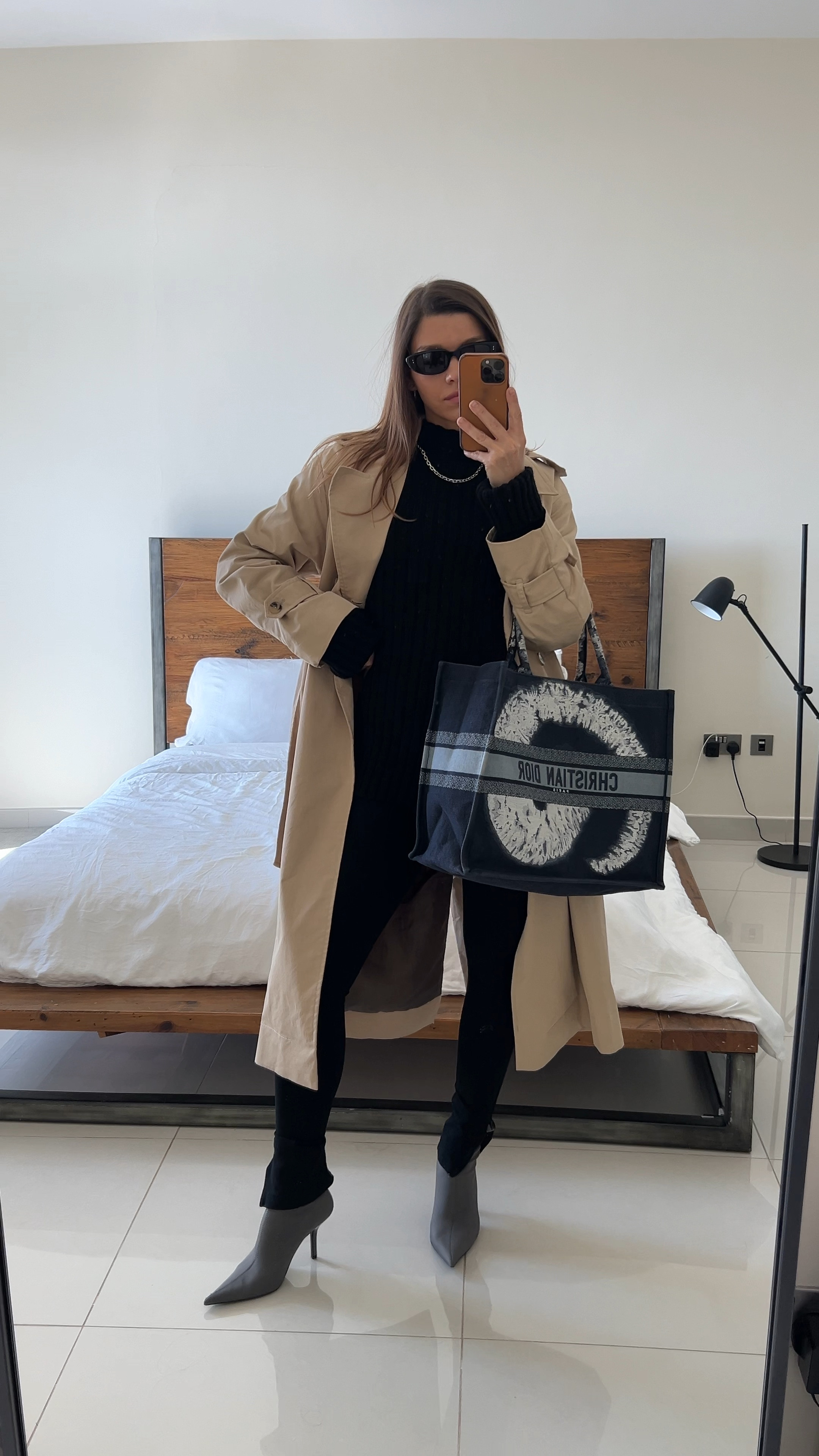 Beige oversized trench, flare leggings, black sweater, tote bag, dior tote, minimal sunglasses, minimal outfit, sock boots 

#LTKSeasonal #LTKfindsunder100 #LTKshoecrush