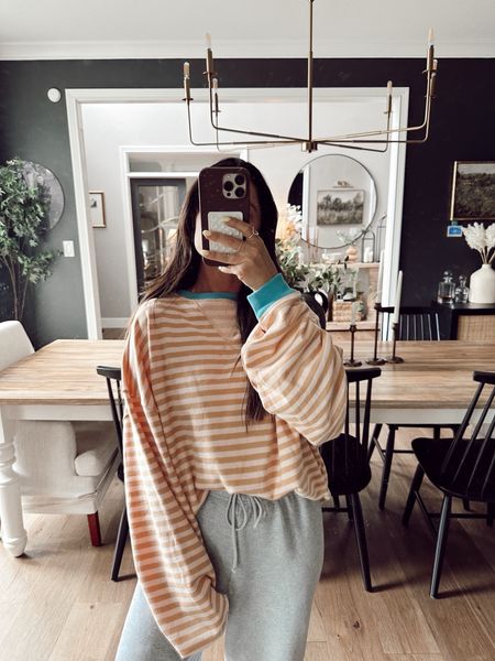 Amazon oversized striped sweatshirt size medium!! 

Summer outfit 
Travel outfit 
Sweatpants 
OOTD 

#LTKSeasonal #LTKOver40 #LTKStyleTip