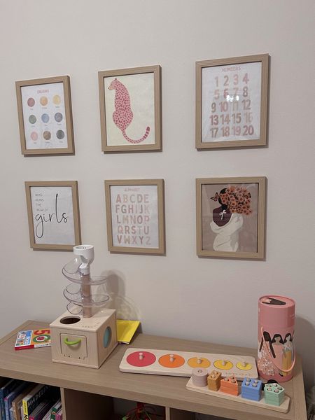 Londyns playroom update! Prints are from Etsy & picture frames are from Amazon! 

Playroom decor, playroom design, baby girl room, wall gallery, toddler room decor, baby girl room decor, wall art, toddler room, play room inspo, playroom storage, amazon home decor, target home decor 

#LTKkids #LTKhome #LTKbaby