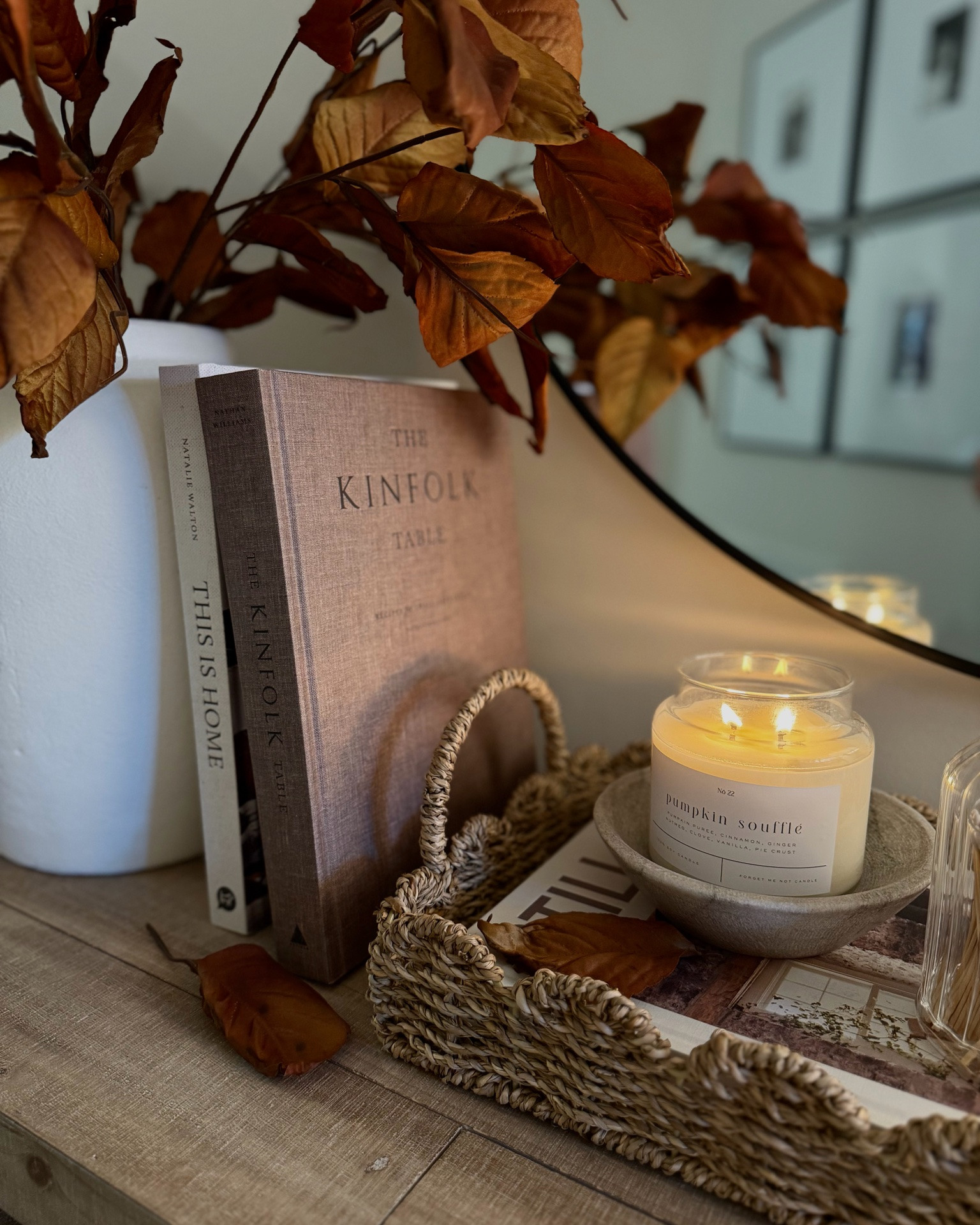 Fall magnolia stems, urn vase, terracotta vase, cream vase, scallop tray, candle bowl, coffee table books, wood console, round mirror, candlesticks, charcoal pumpkin

#LTKU #LTKSeasonal #LTKHome