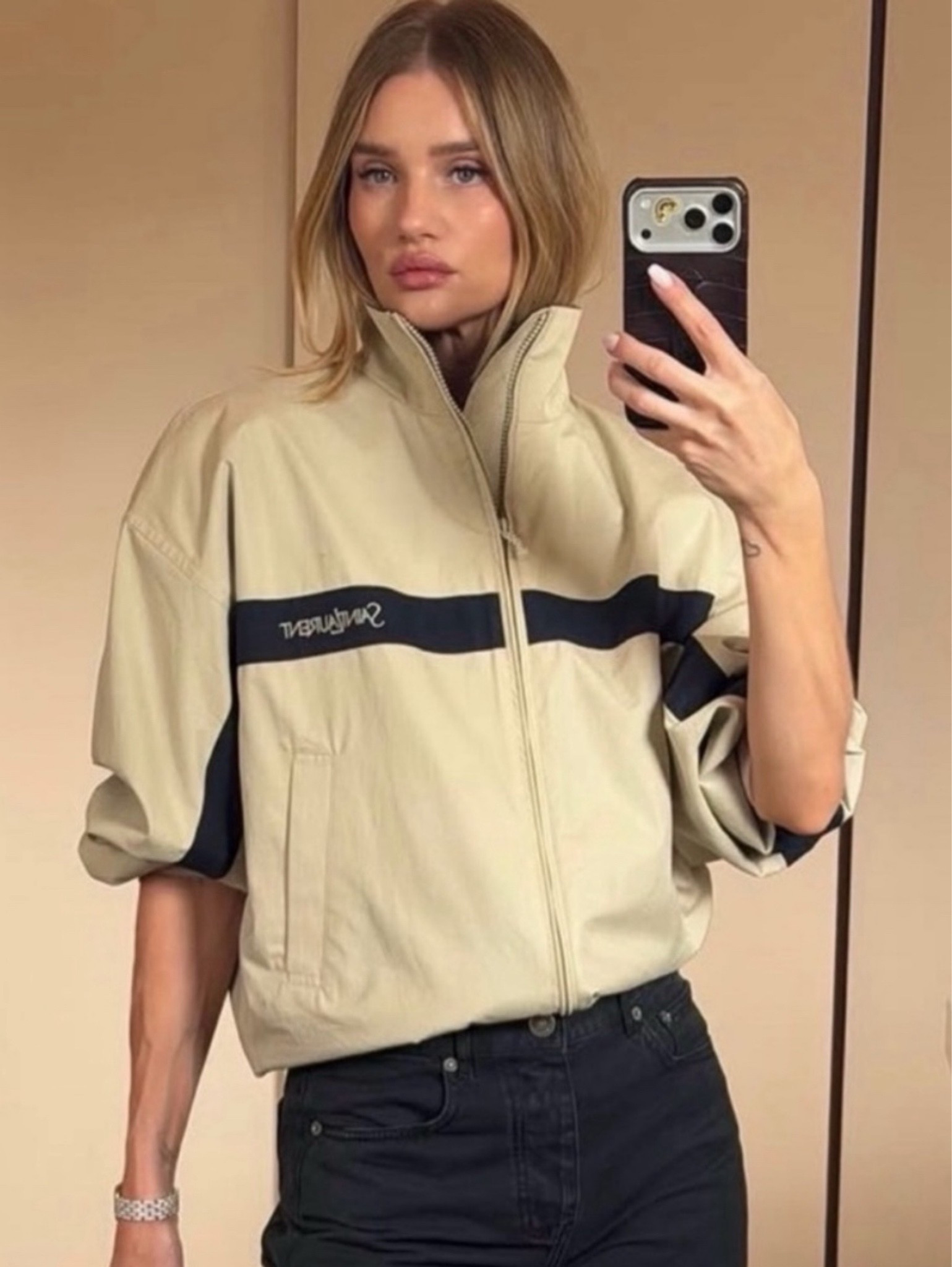 veryone from Rihanna to some of the biggest influencers have gravitated towards this athletic, super-chic cotton jacket, complete with the Cassandre zipper and Saint Laurent embroidery on the chest.

This jacket is part of Saint Laurent’s Resort 2026 collection and has clearly become a street-style favorite, simply judging by the number of people online wearing it and heading to stores specifically to try it on. 

Here's a look for less option